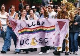 group holding LGBT banner