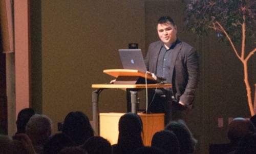 photo of Jose Antonio Vargas speaking at lectern at UCSC